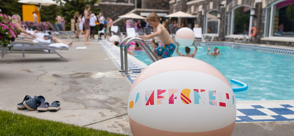 families enjoying the pool