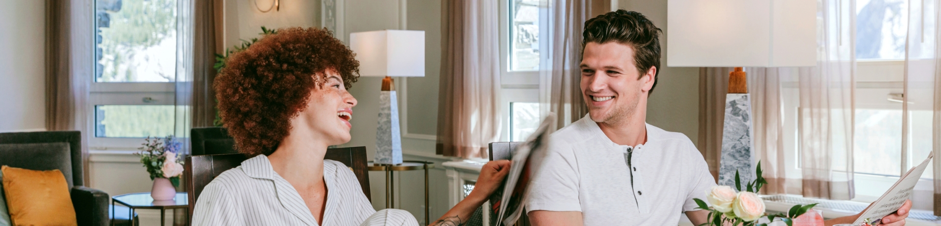 couple eating breakfast in their room
