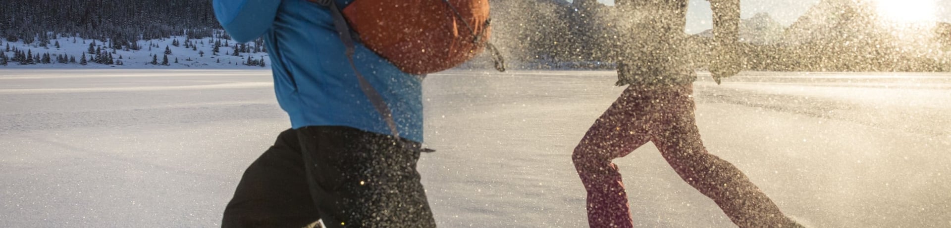 people running in snow shoes