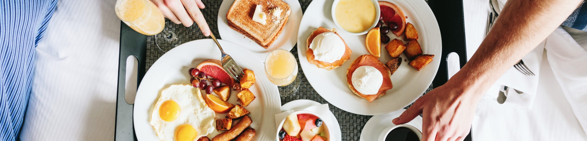 breakfast tray on a bed