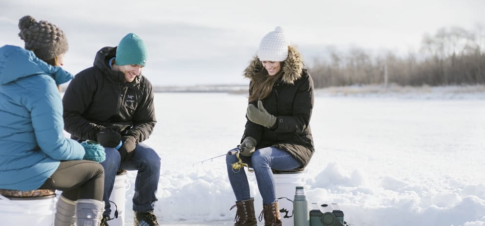 a group of friends ice fishing