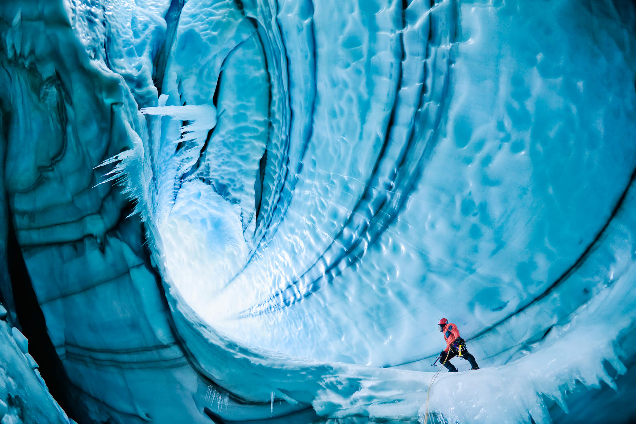 man ice climbing