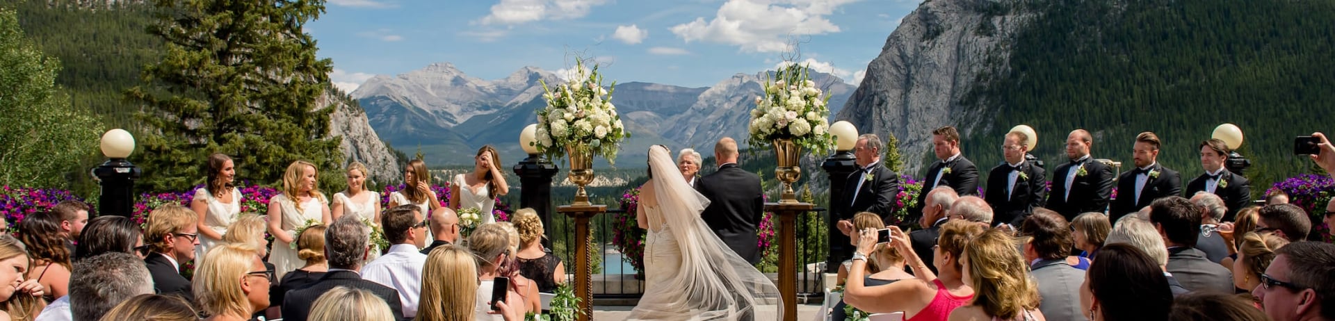 a bride and groom getting married outside