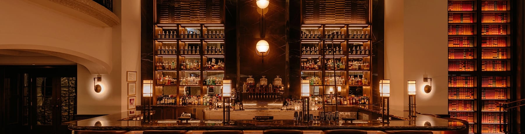 rundle bar bar area with large book shelves
