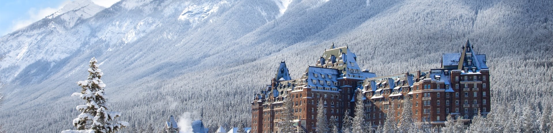 view of hotel from a trail in the winter