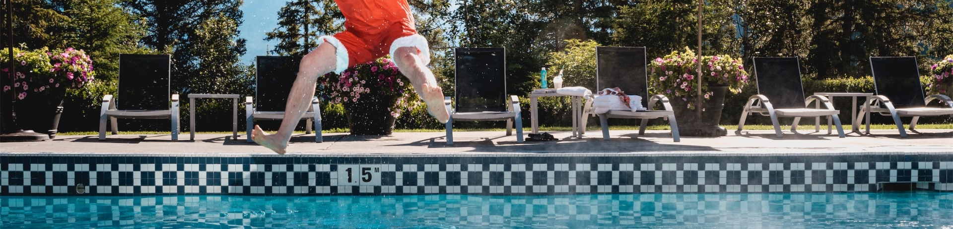 santa jumping into a pool