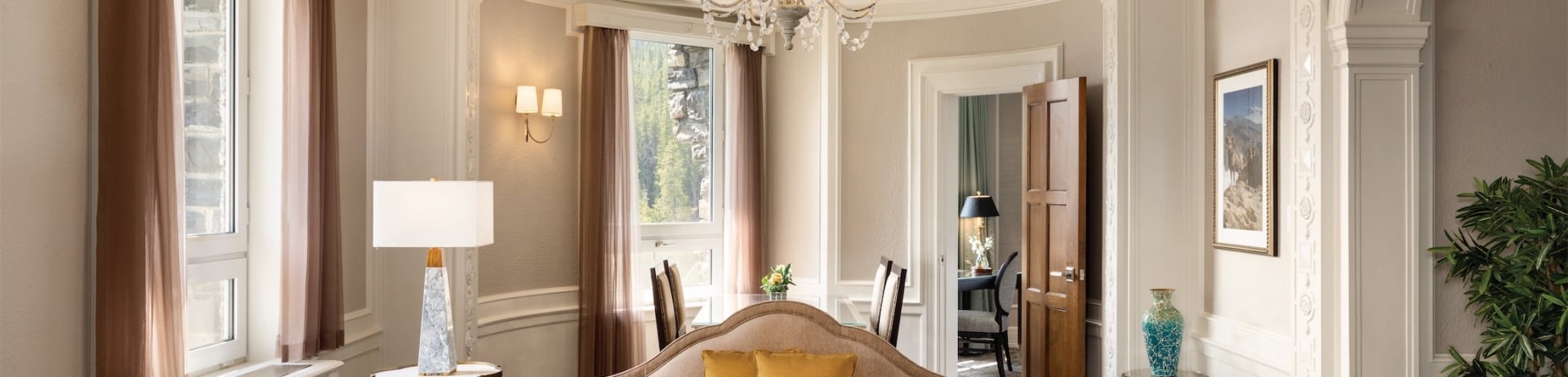 living room with sofa and two chairs