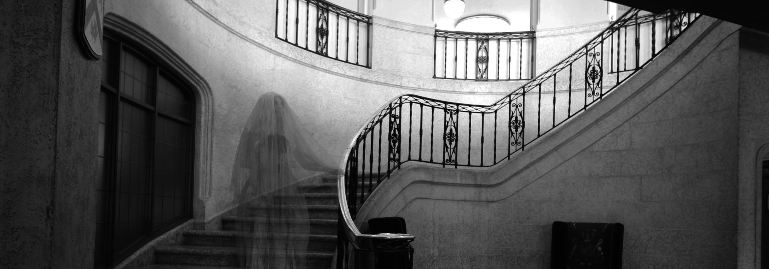 Ghost Bride on the staircase at Fairmont Banff Springs.